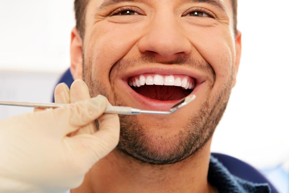 dental implants high point | man at dentist