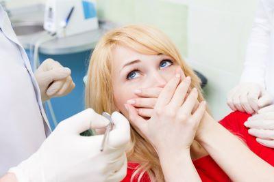 dental anxiety high point | woman stressed at dentist