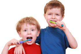 Photo of kids brushing their teeth in High Point NC