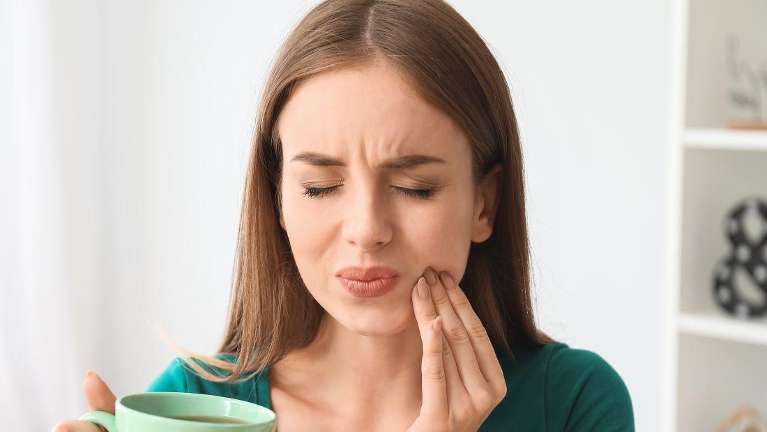 A patient with tooth ache problem before removal in High Point, NC