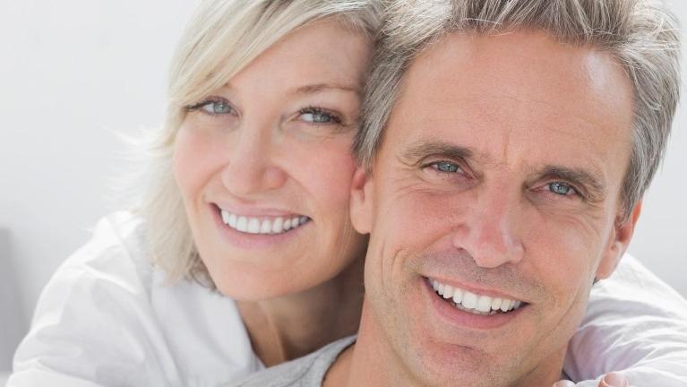 couple with dental implants in high point nc