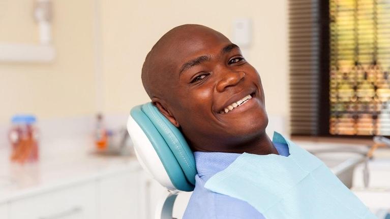 man relaxing during dental exam in high point nc